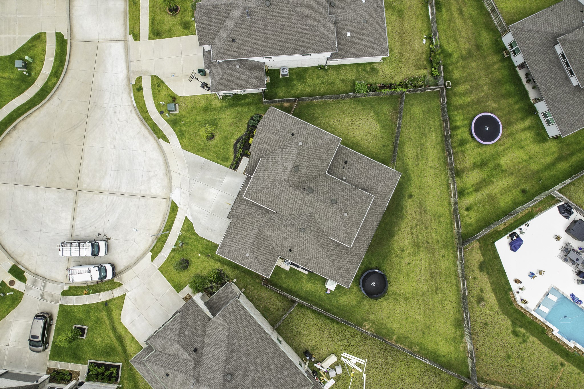 10009 Gray Jay Court Conroe, TX 77384 - Photo 46 of 47 an aerial view of a house with a swimming pool