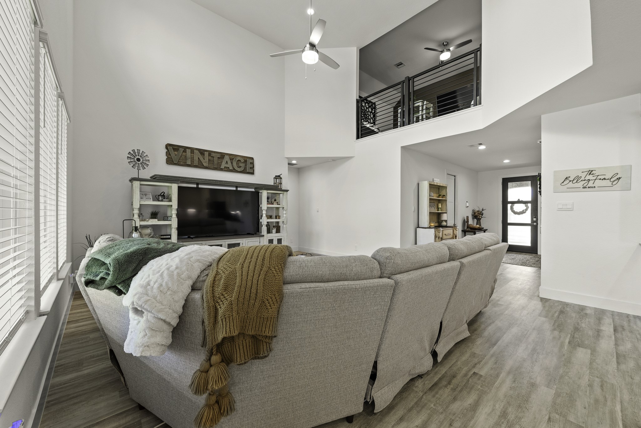 10009 Gray Jay Court Conroe, TX 77384 - Photo 9 of 47 a living room with furniture and a fireplace