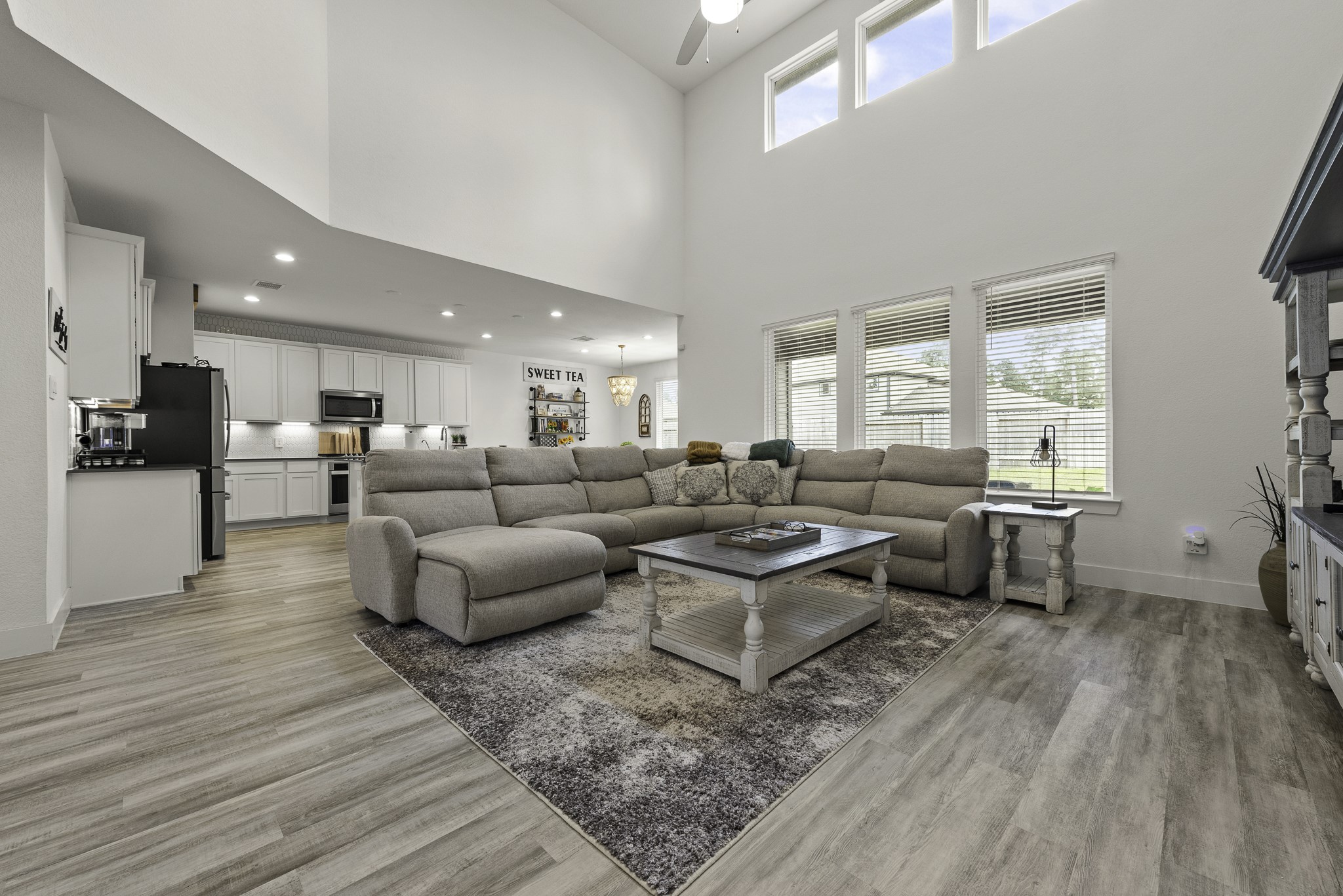 10009 Gray Jay Court Conroe, TX 77384 - Photo 10 of 47 a living room with furniture and a wooden floor