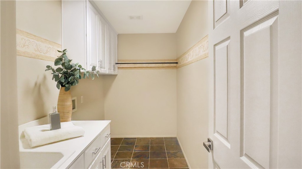 3759 Dewcrest Court Chino, CA 91710 - Photo 24 of 45 a bathroom with a sink and a mirror