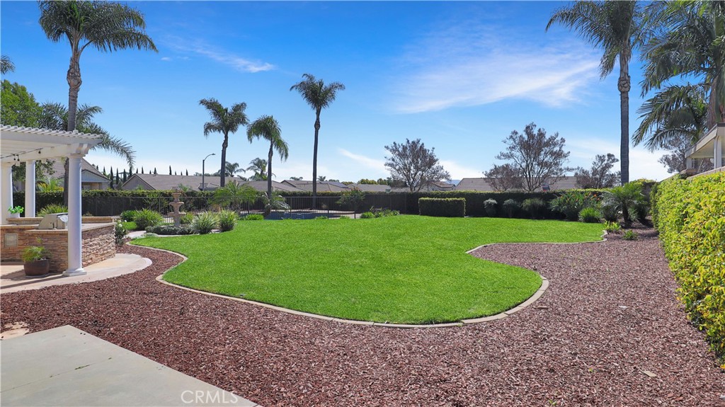 3759 Dewcrest Court Chino, CA 91710 - Photo 34 of 45 a view of a garden with a fountain