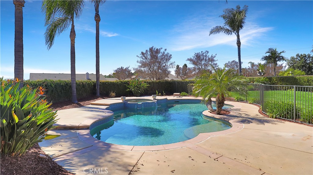 3759 Dewcrest Court Chino, CA 91710 - Photo 35 of 45 a view of a swimming pool with a yard