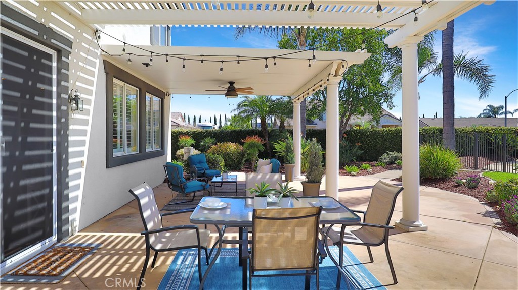 3759 Dewcrest Court Chino, CA 91710 - Photo 38 of 45 a view of a patio with table and chairs and potted plants