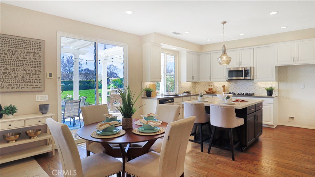3759 Dewcrest Court Chino, CA 91710 - Photo 9 of 45 a view of kitchen with dining table and chairs