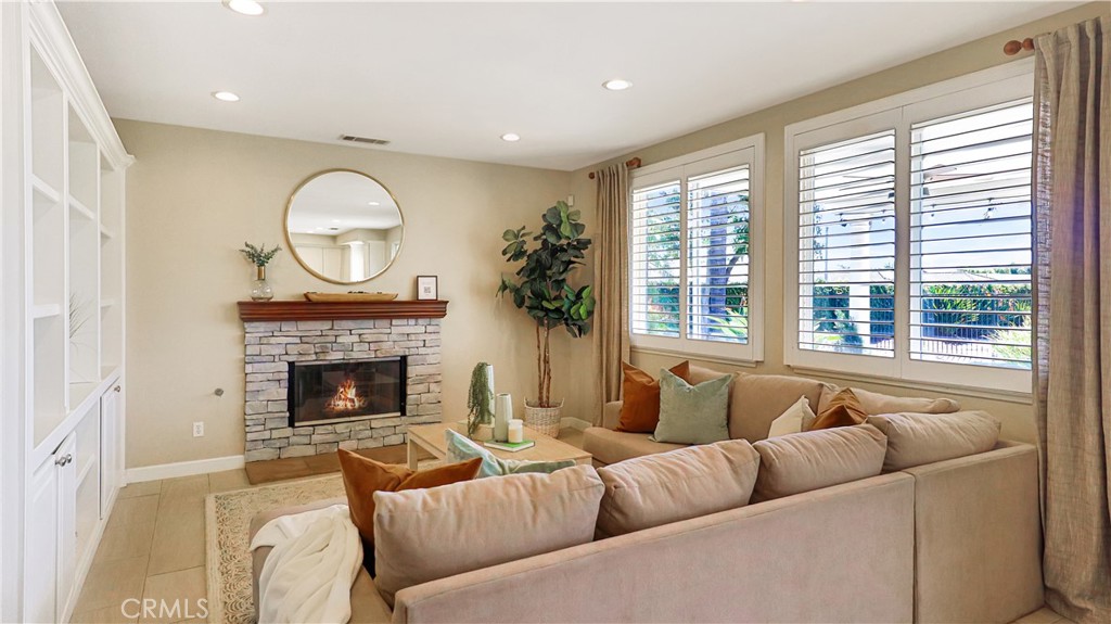 3759 Dewcrest Court Chino, CA 91710 - Photo 10 of 45 a living room with furniture and a fireplace