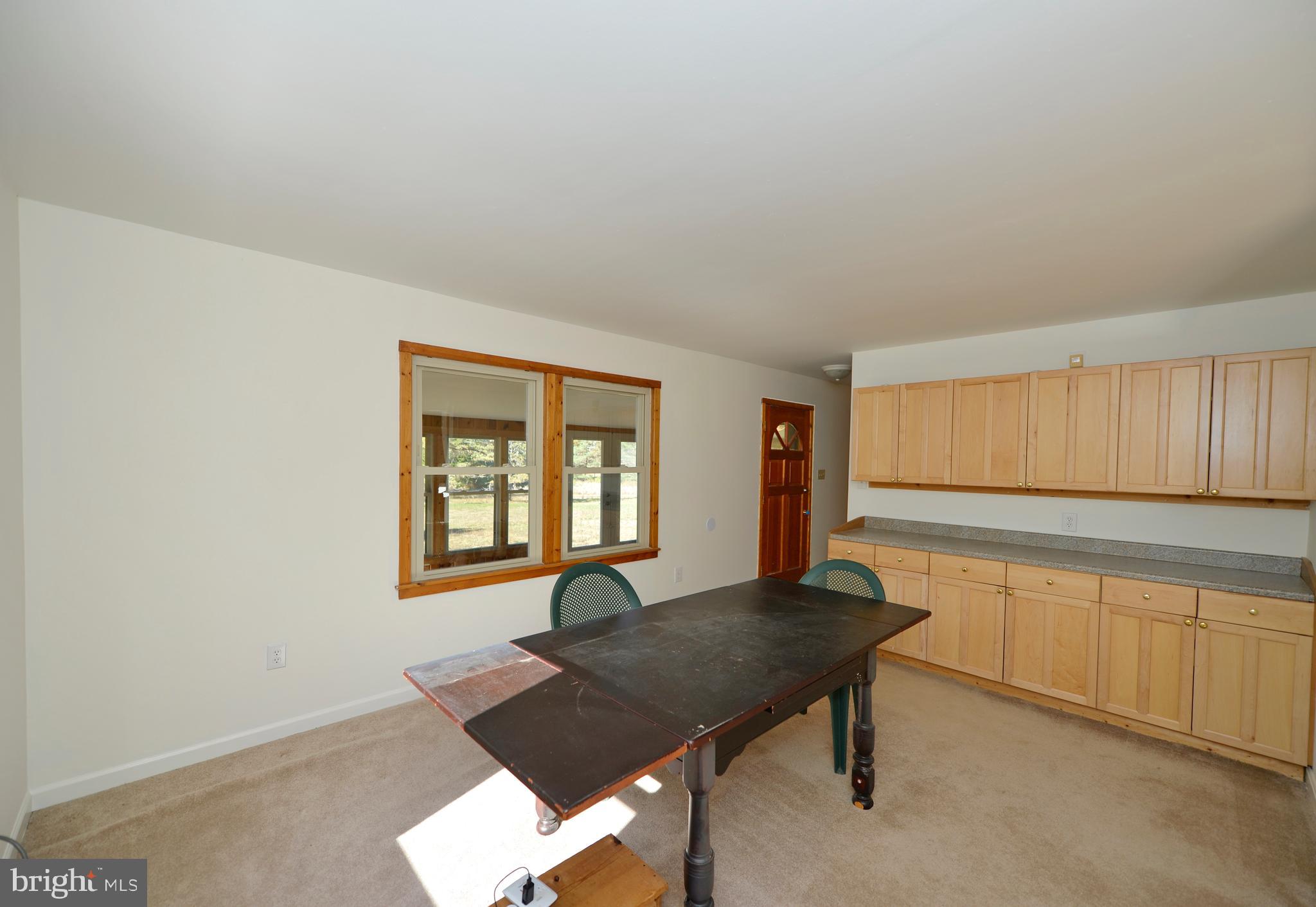 4485 Smokey Hollow Road Bloomery, WV 26817 - Photo 36 of 78 Dining room with with butlers pantry