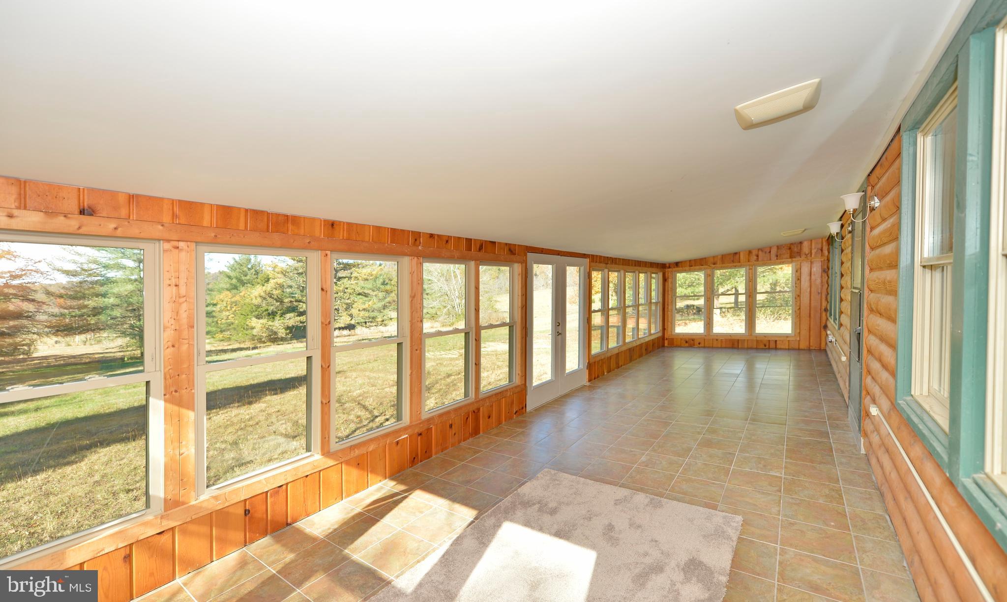 4485 Smokey Hollow Road Bloomery, WV 26817 - Photo 37 of 78 Spectacular light filled solarium