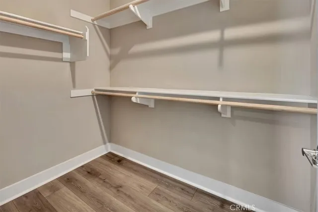 a view of an empty walk in closet