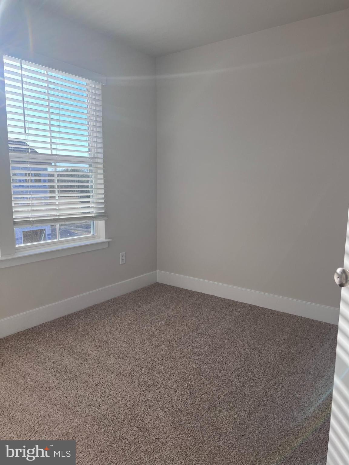 152 Munsee Circle Winchester, VA 22602 - Photo 17 of 19 an empty room with a window
