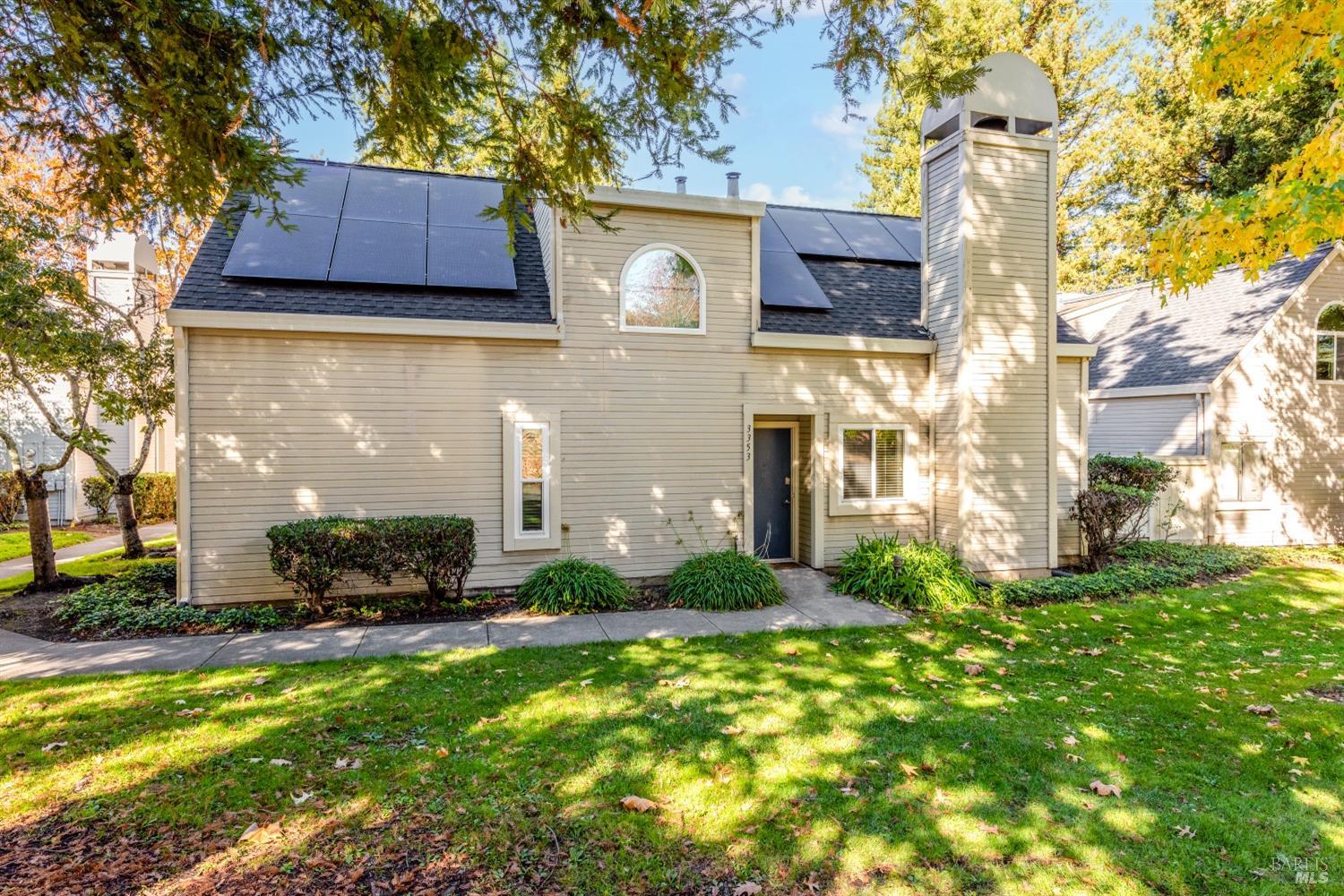 3353 Yulupa Avenue Santa Rosa, CA 95405 - Photo 1 of 1 a front view of house with yard and green space