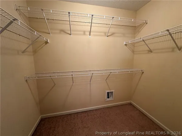 a view of a room with racks on the wall