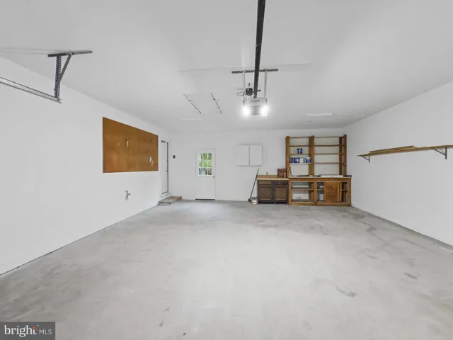 a view of a livingroom with furniture and furniture