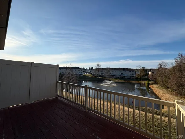 a view of balcony with furniture