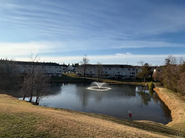 a view of a lake from a balcony