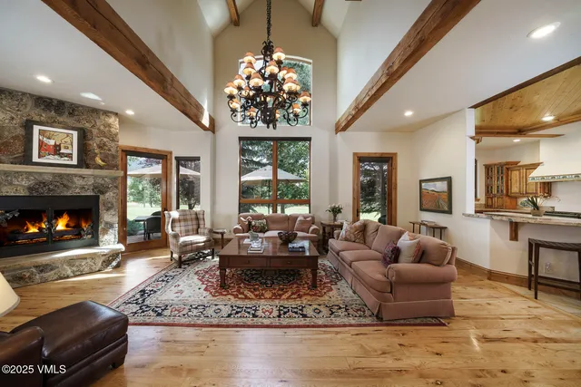 a bedroom with a bed and glass door
