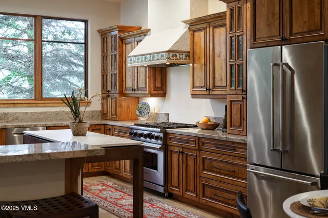 a bathroom with a toilet and a mirror