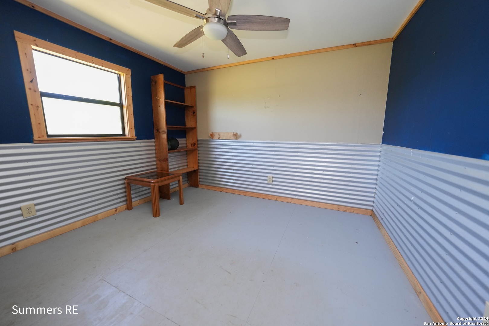 5077 Old Pontotoc Road Mason, TX 76856 - Photo 31 of 41 a view of a room with wooden floor and windows