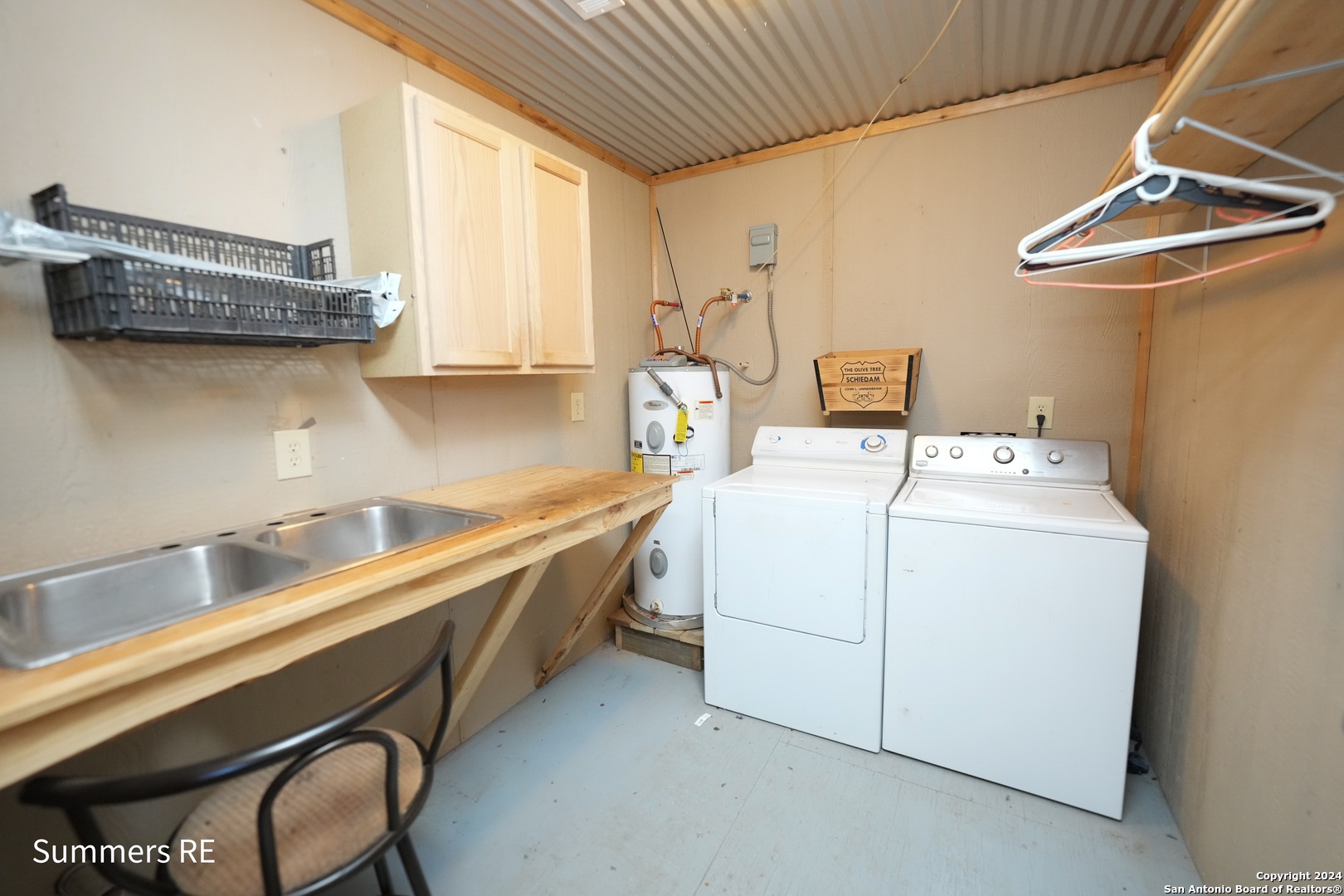 5077 Old Pontotoc Road Mason, TX 76856 - Photo 34 of 41 a utility room with dryer and washer