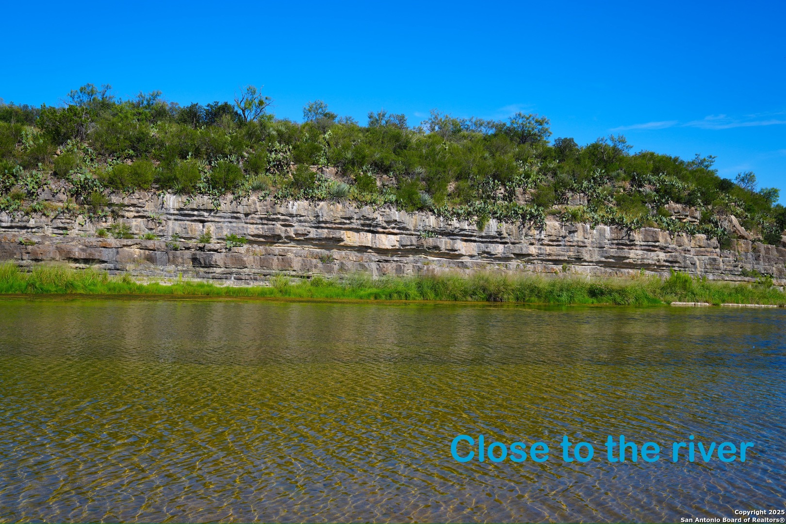 5077 Old Pontotoc Road Mason, TX 76856 - Photo 41 of 41 a view of a lake with houses in the back