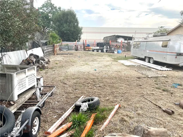 a view of a patio with a yard