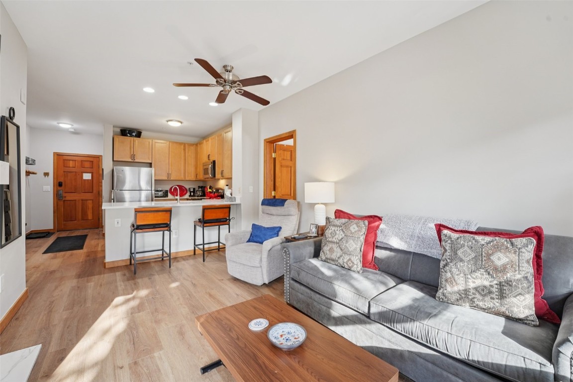 22714 Highway 6, Unit 5971 Keystone, CO 80435 - Photo 4 of 21 a living room with furniture and kitchen view
