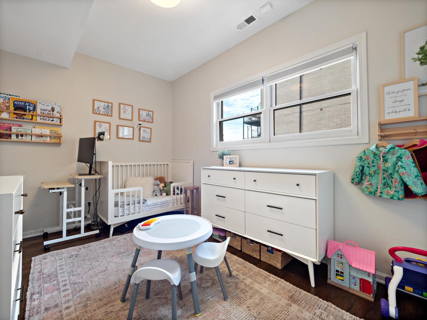 1531 West Walton Street, Unit 1 Chicago, IL 60642 - Photo 17 of 20 a living room with furniture and a toilet