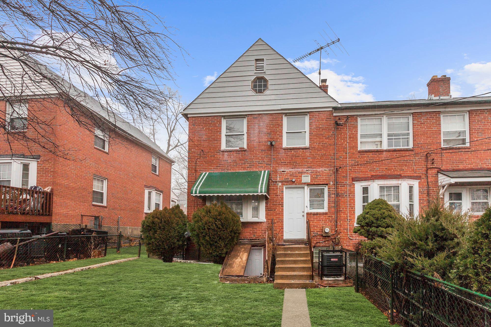 4510 Marble Hall Road Baltimore, MD 21239 - Photo 24 of 24 a front view of a house with garden
