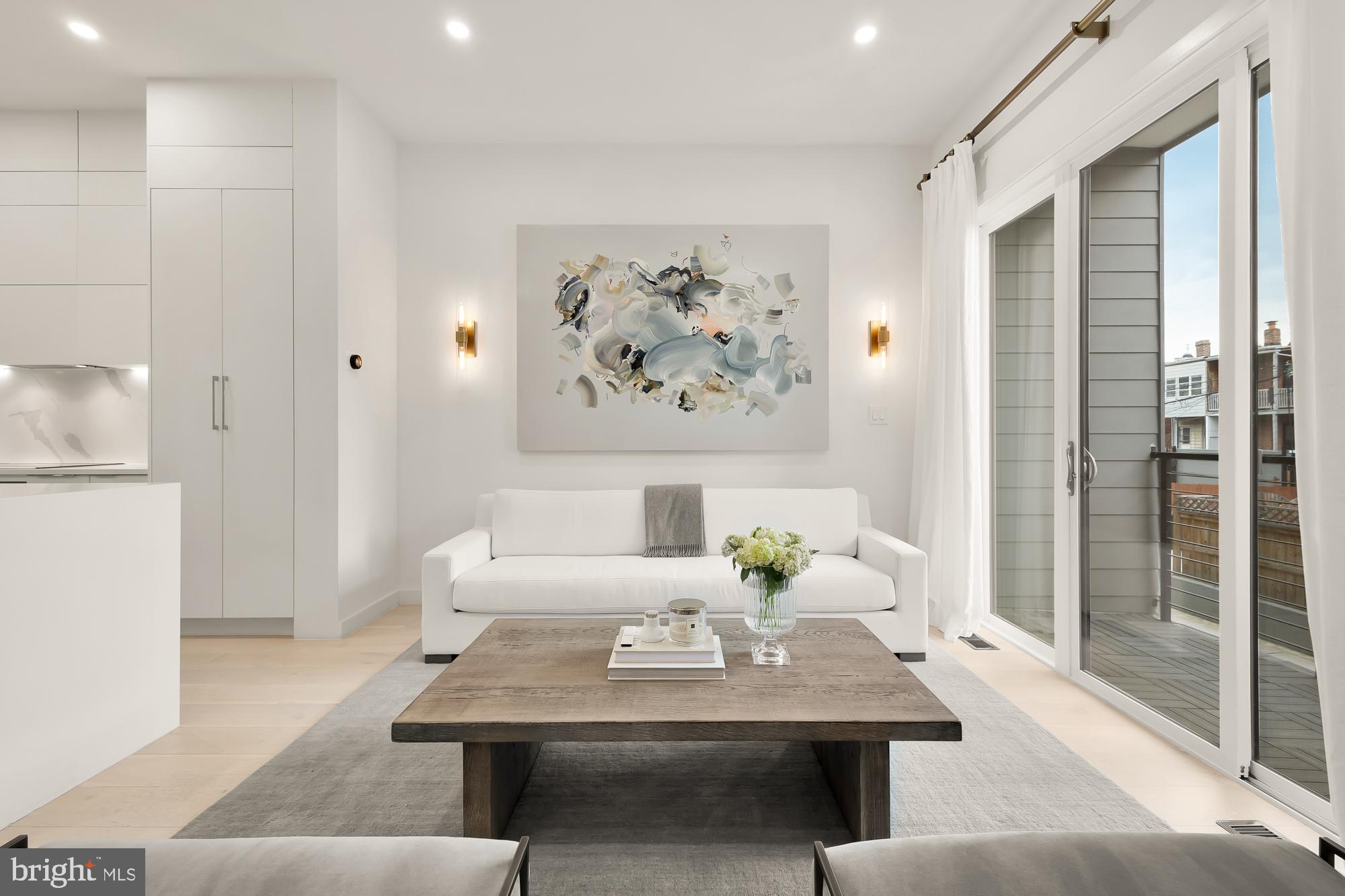 146 S Street Northwest, Unit B Washington, DC 20001 - Photo 17 of 51 a view of a dining room with furniture and a potted plant