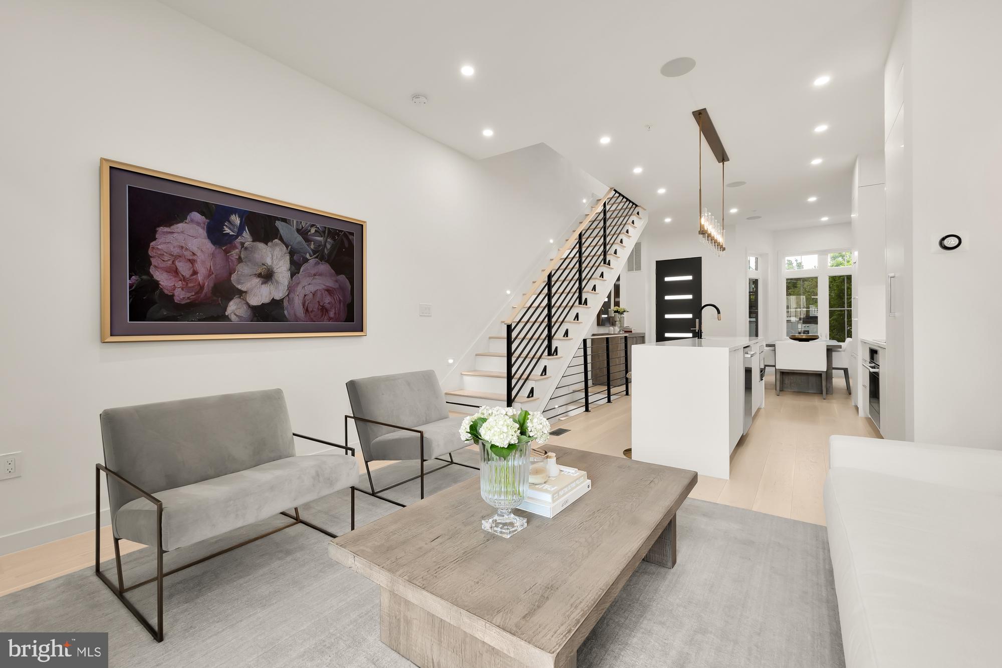 146 S Street Northwest, Unit B Washington, DC 20001 - Photo 20 of 51 a living room with furniture and kitchen view