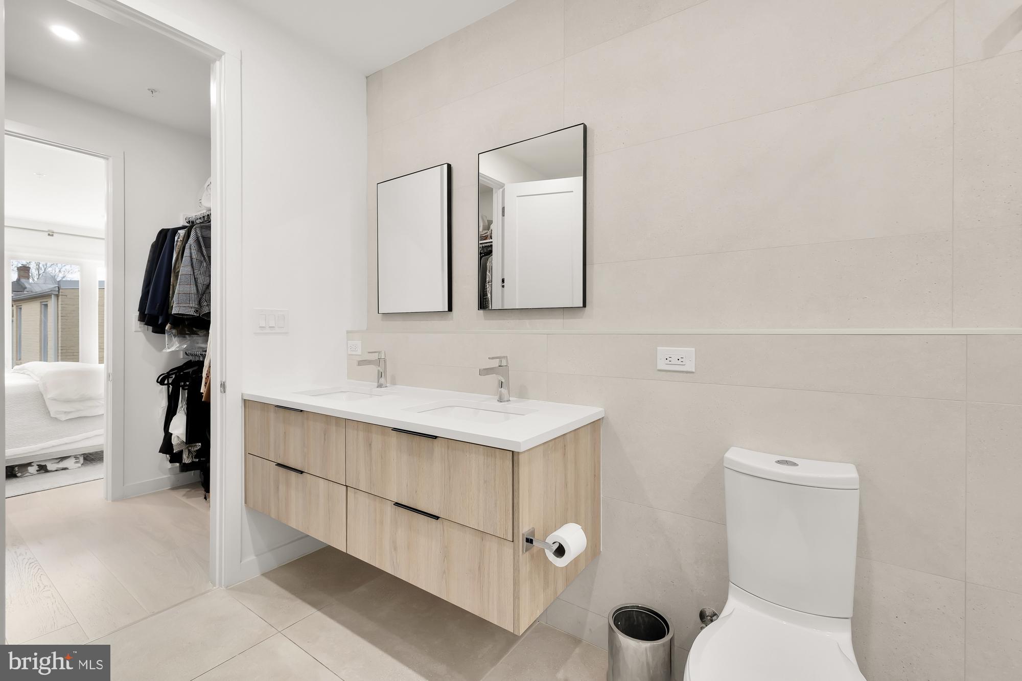 146 S Street Northwest, Unit B Washington, DC 20001 - Photo 30 of 51 a bathroom with a sink toilet and shower