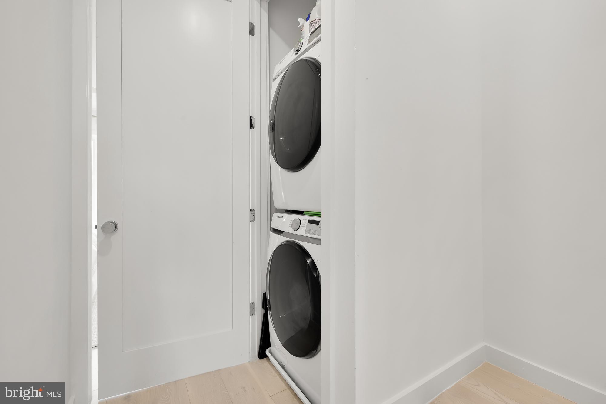146 S Street Northwest, Unit B Washington, DC 20001 - Photo 32 of 51 a close view of utility room with washer and dryer
