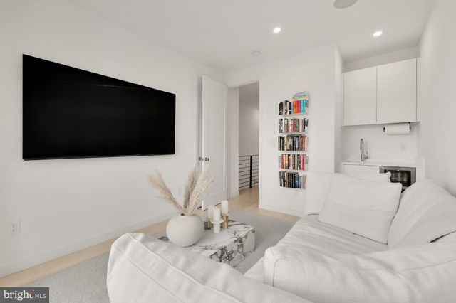 a view of a terrace with seating area