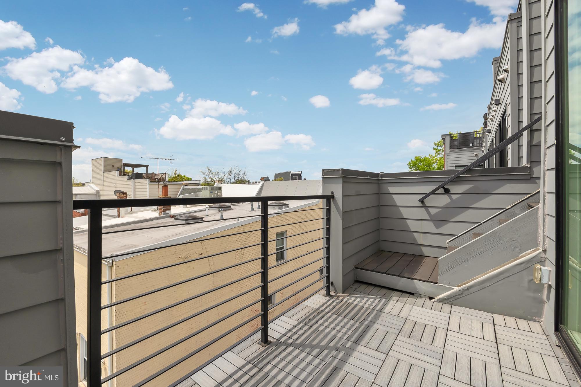 146 S Street Northwest, Unit B Washington, DC 20001 - Photo 39 of 51 a view of a balcony with an outdoor space