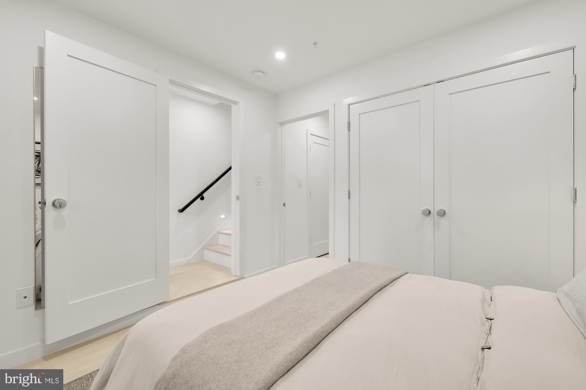 146 S Street Northwest, Unit B Washington, DC 20001 - Photo 44 of 51 a bedroom with a bed and a shower