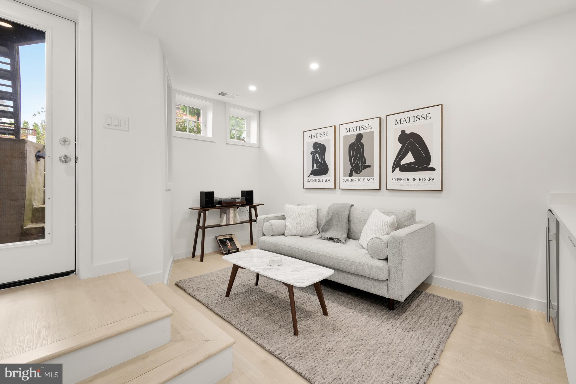 146 S Street Northwest, Unit B Washington, DC 20001 - Photo 46 of 51 a living room with furniture and a window