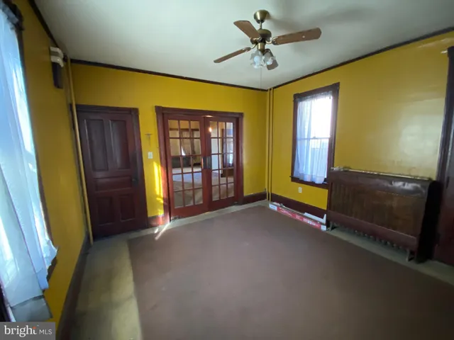 a view of an entryway with a livingroom