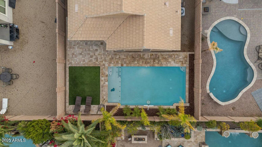 2220 East Stacey Road Gilbert, AZ 85298 - Photo 27 of 54 an aerial view of a house with garden space and plants