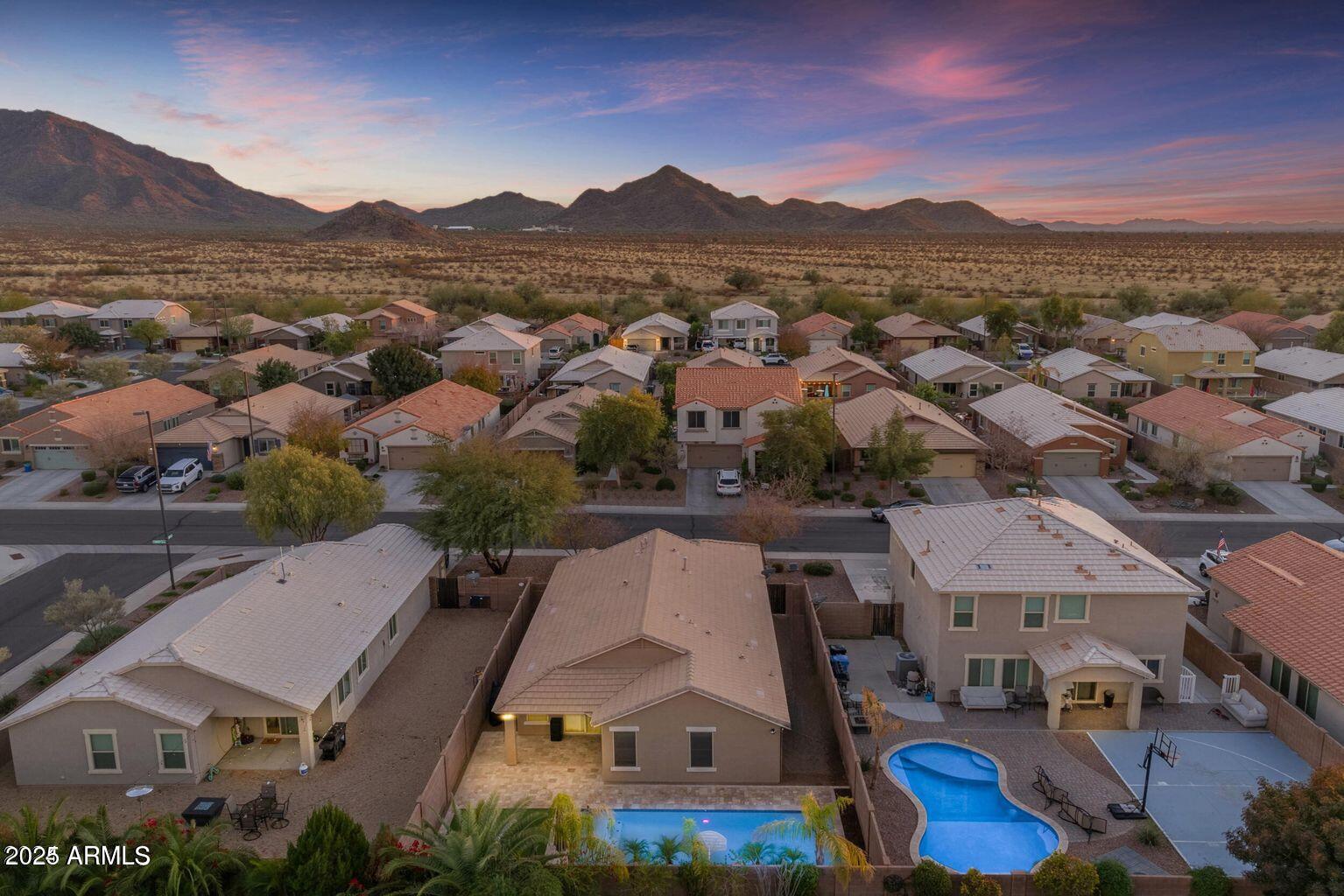 2220 East Stacey Road Gilbert, AZ 85298 - Photo 29 of 54 an aerial view of residential houses and outdoor space