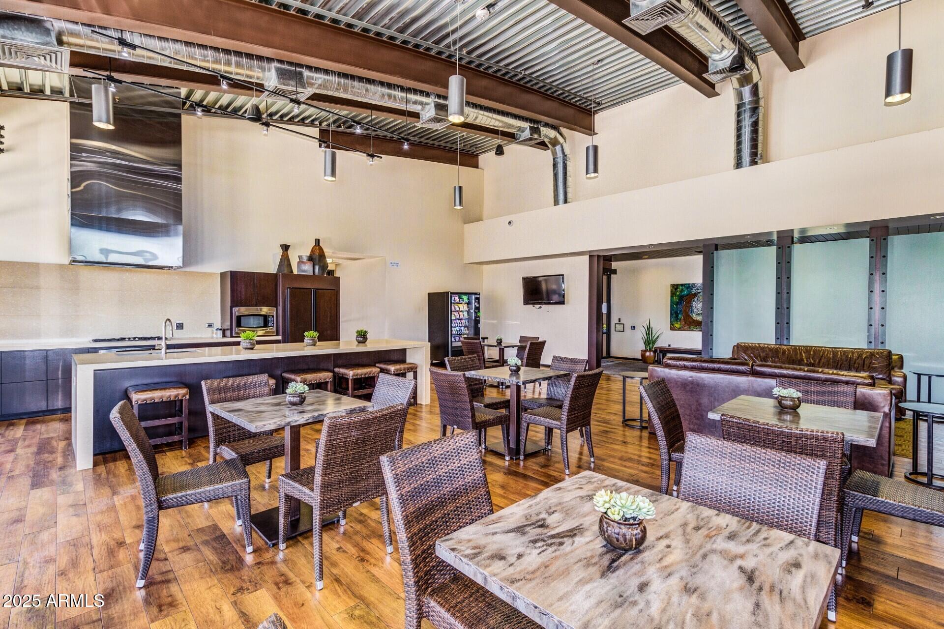 2220 East Stacey Road Gilbert, AZ 85298 - Photo 37 of 54 a dinning table and chairs in a patio