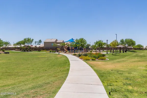 a view of a house with a yard porch and sitting area
