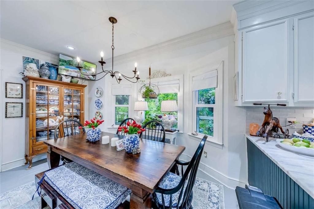6180 Old Jefferson Road Athens, GA 30607 - Photo 30 of 95 a view of a dining room with furniture window and wooden floor