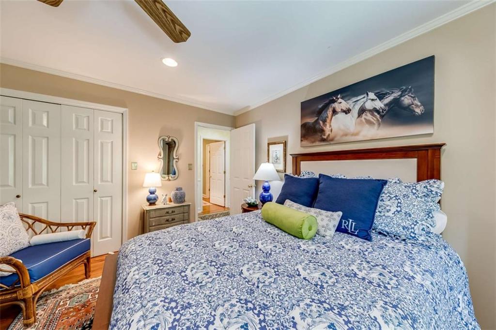 6180 Old Jefferson Road Athens, GA 30607 - Photo 53 of 95 a bed room with a bed and a painting on the wall