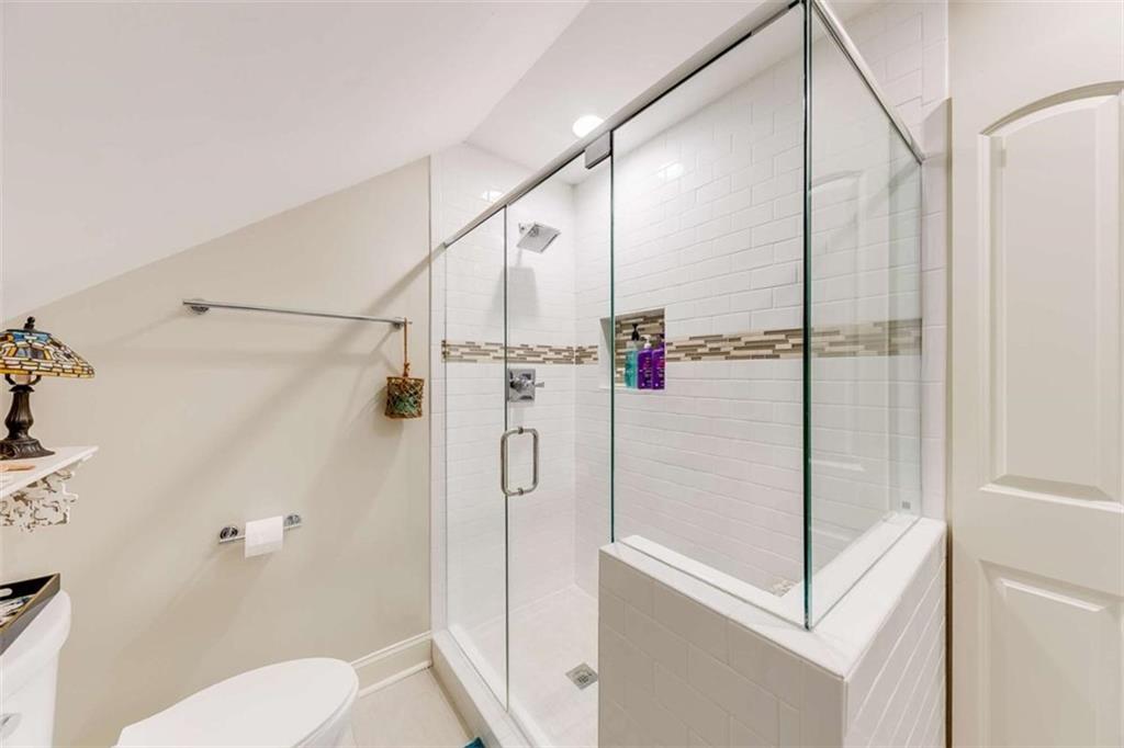 6180 Old Jefferson Road Athens, GA 30607 - Photo 60 of 95 a bathroom with a shower and a toilet