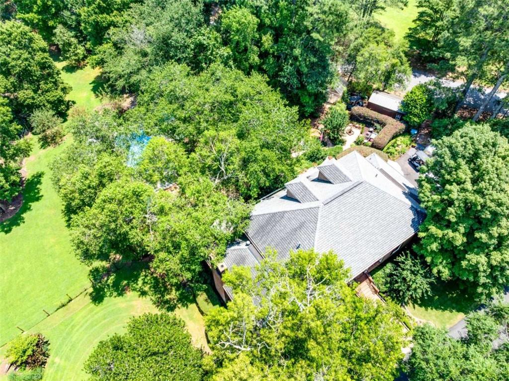 6180 Old Jefferson Road Athens, GA 30607 - Photo 87 of 95 an aerial view of a house with a yard and large trees