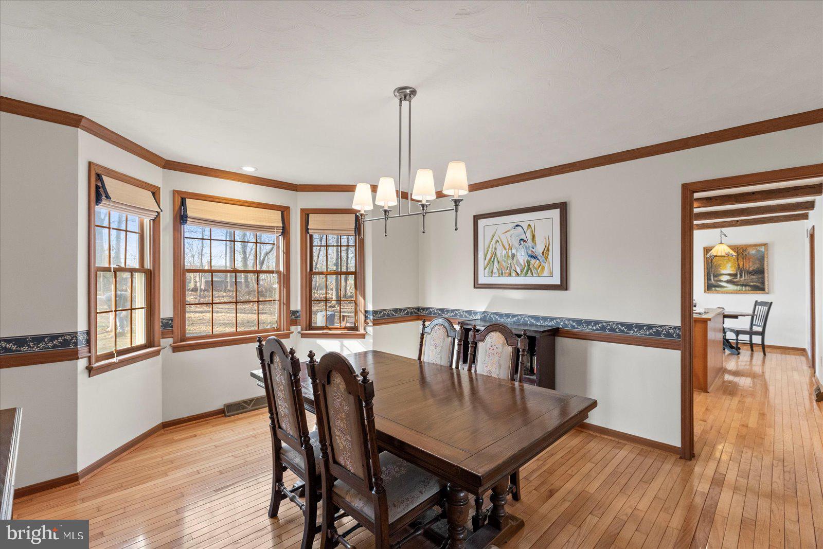 437 Valley View Drive Hanover, PA 17331 - Photo 12 of 40 a view of a dining room with furniture window and wooden floor