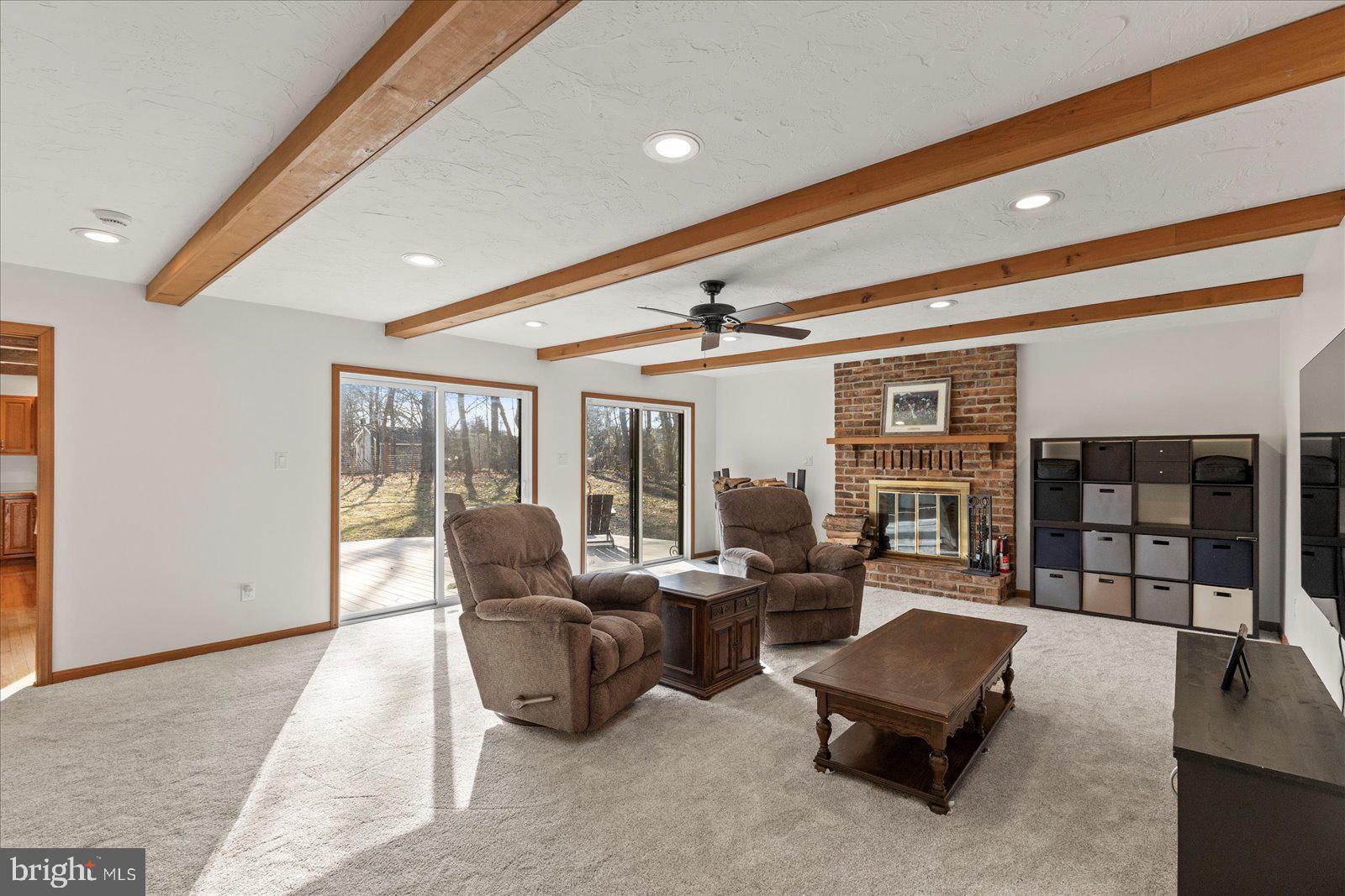 437 Valley View Drive Hanover, PA 17331 - Photo 14 of 40 a living room with furniture a rug and a large window