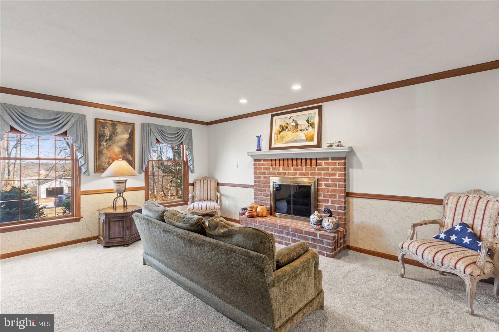 437 Valley View Drive Hanover, PA 17331 - Photo 17 of 40 a living room with furniture and a fireplace
