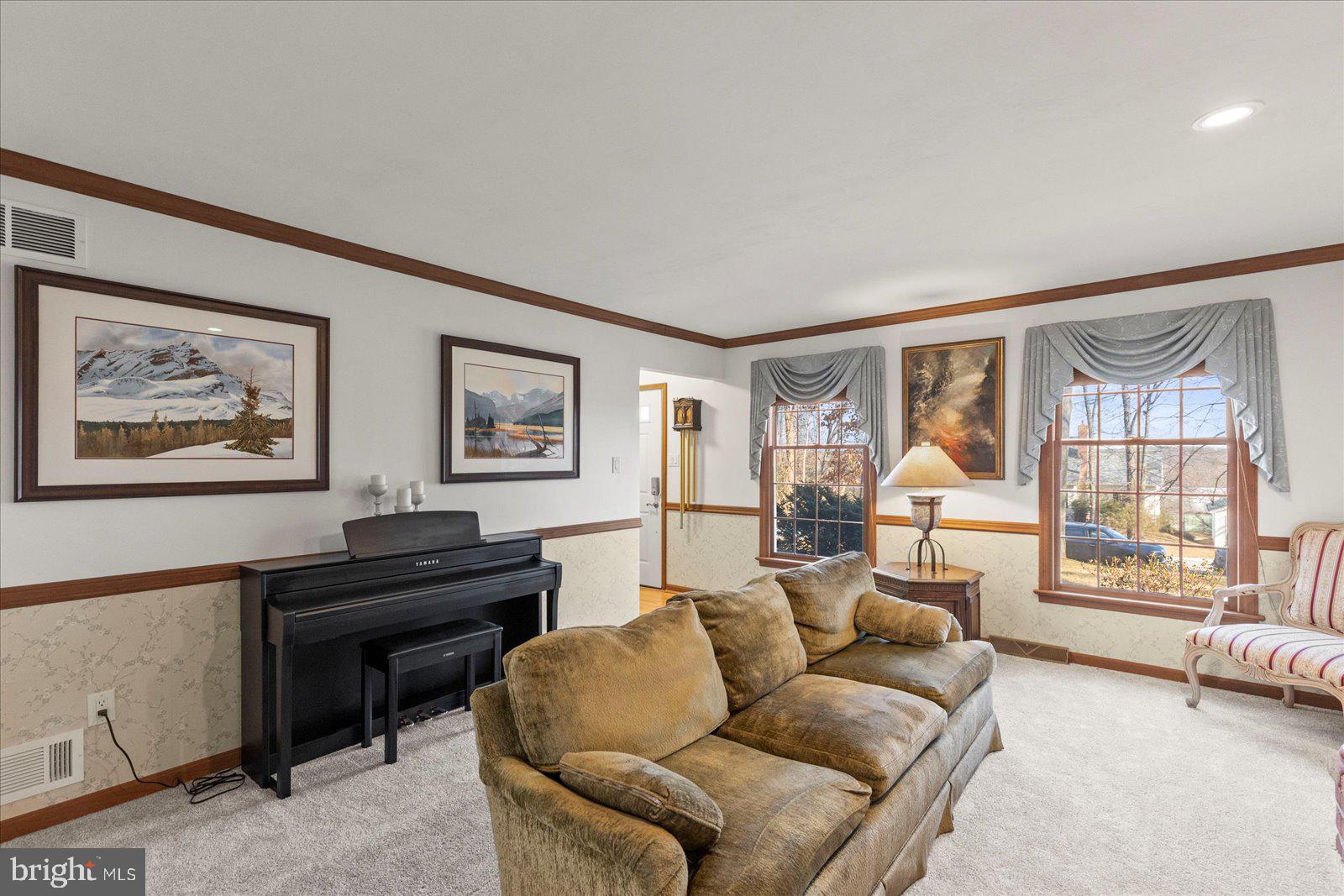 437 Valley View Drive Hanover, PA 17331 - Photo 18 of 40 a living room with furniture a ceiling fan and a window