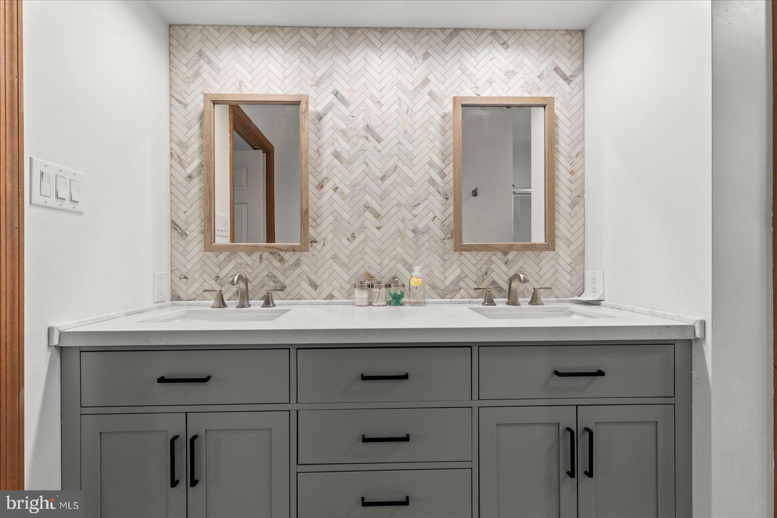 437 Valley View Drive Hanover, PA 17331 - Photo 21 of 40 a bathroom with a sink and a mirror