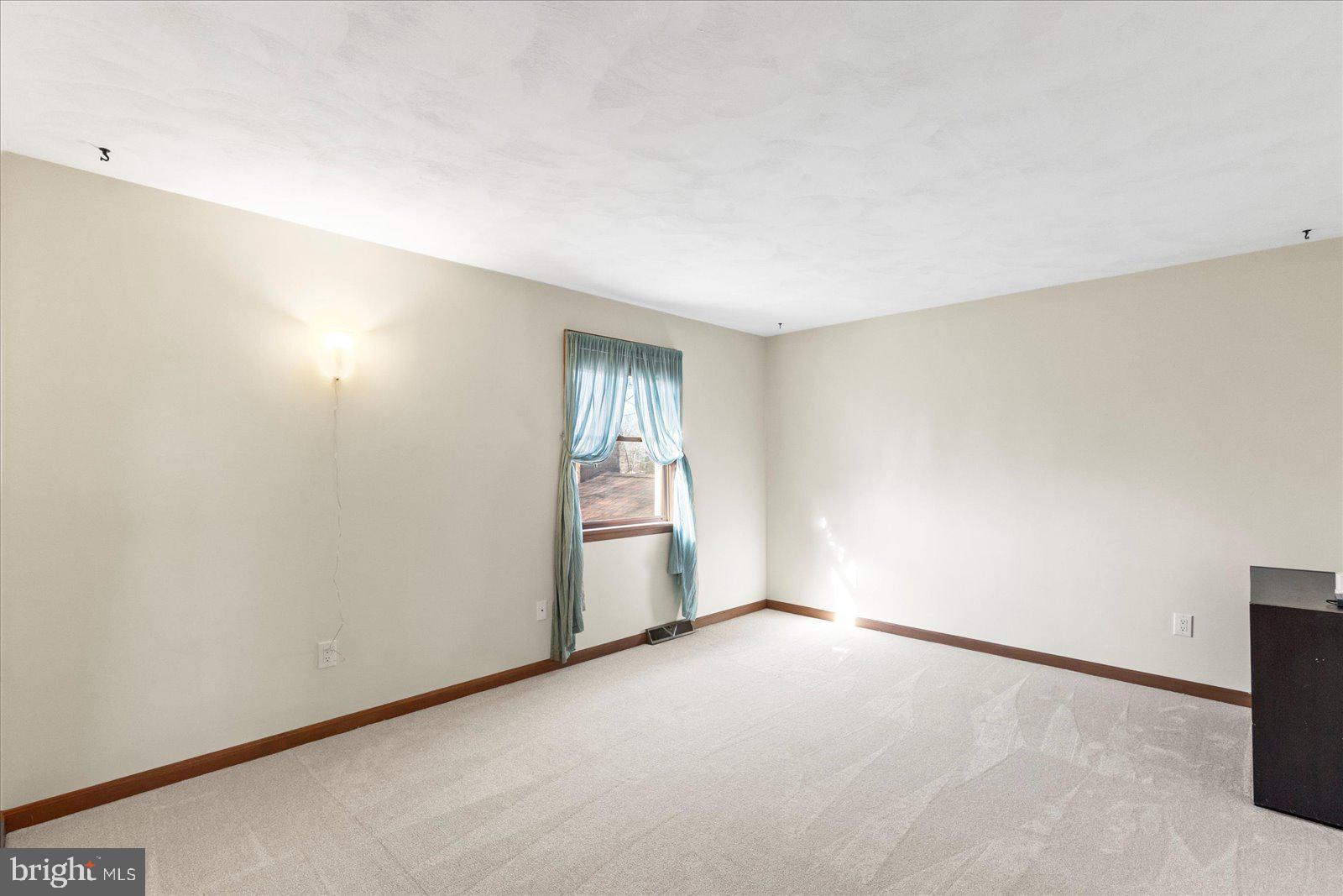 437 Valley View Drive Hanover, PA 17331 - Photo 25 of 40 an empty room with windows